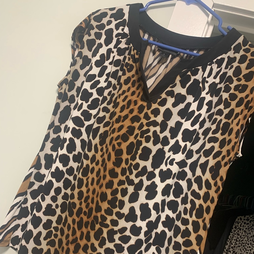 Worthington sleeveless cheetah print blouse.